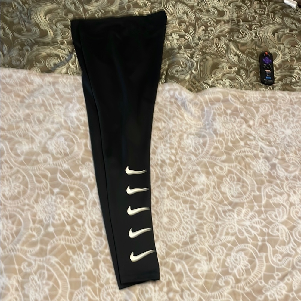 Nike Black Leggings with Multiple White Swooshes